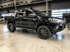 Toyota Hilux on hussla stealth gloss black milled 3